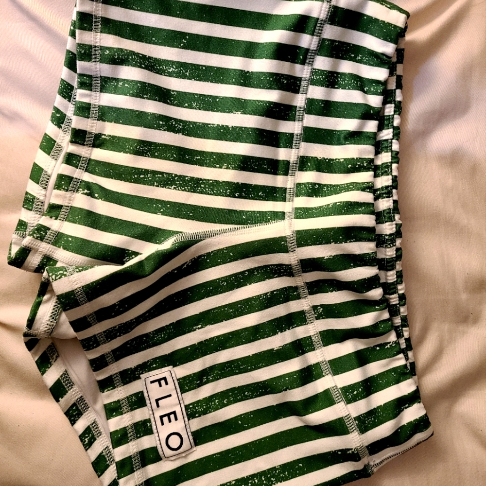 Green and white Fleo shorts 3.25 inseam